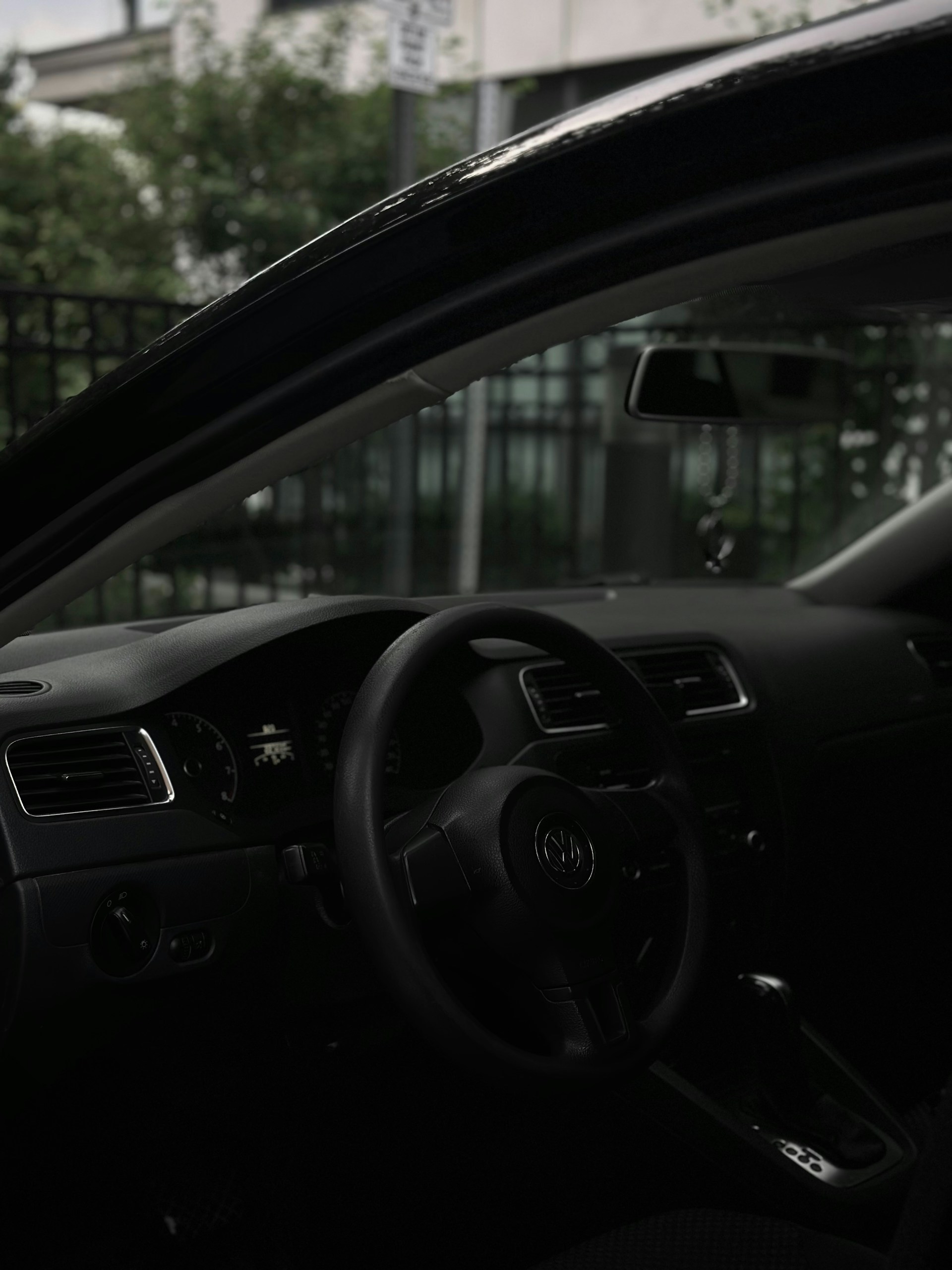 a black and white photo of a car dashboard