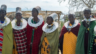 a group of women standing next to each other