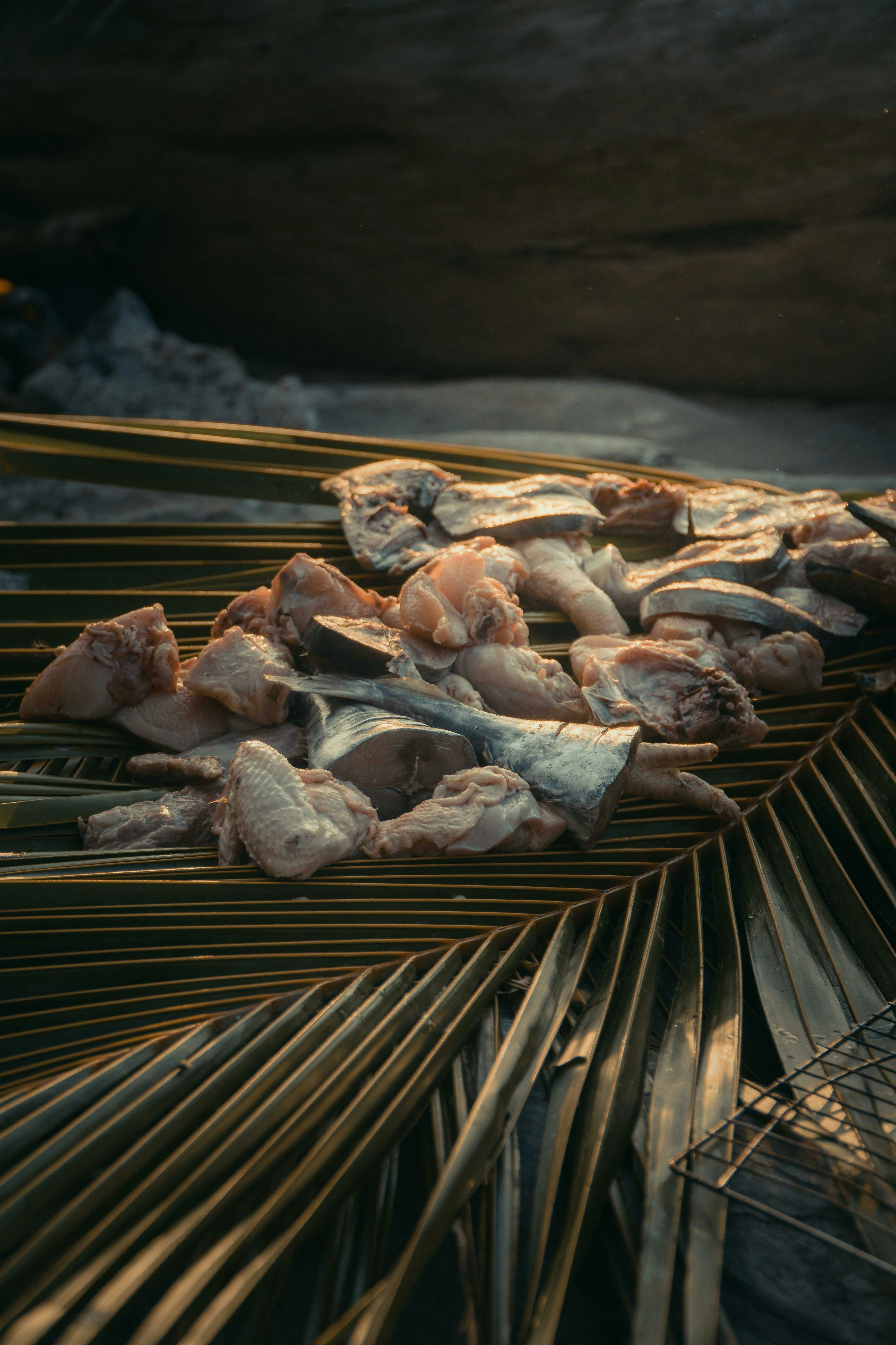 a pile of food sitting on top of a wooden table