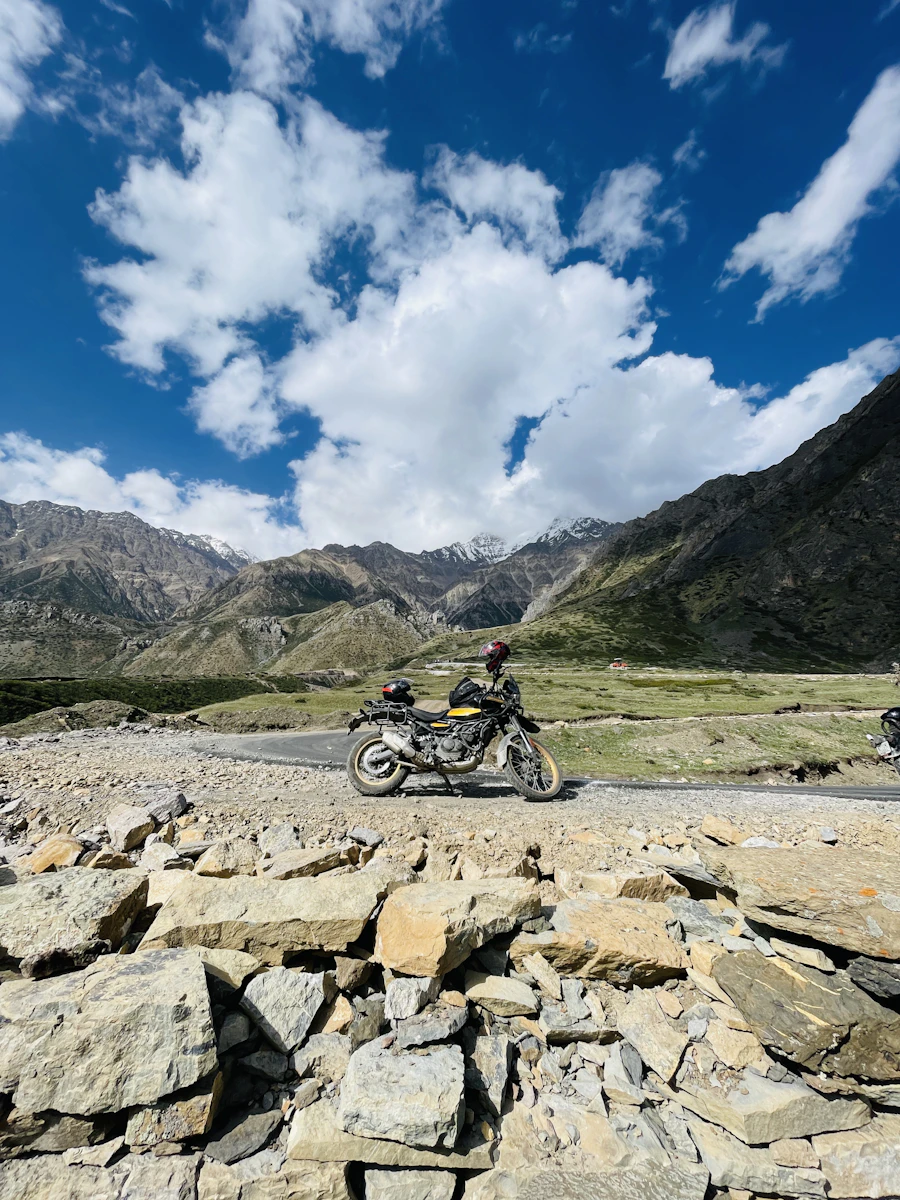 Motorcycle parked on a rocky off-road trail in the Nepali Himalayas