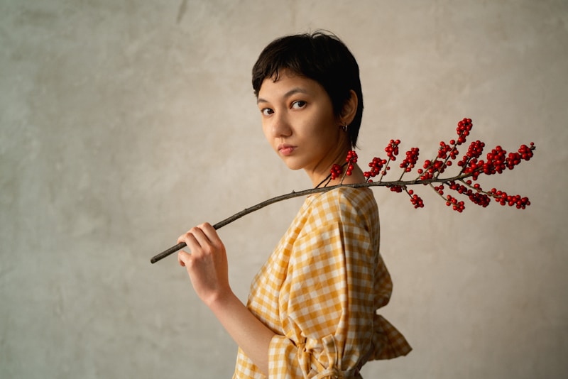 Charming lady with red berries