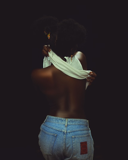 a woman with her back turned to the camera