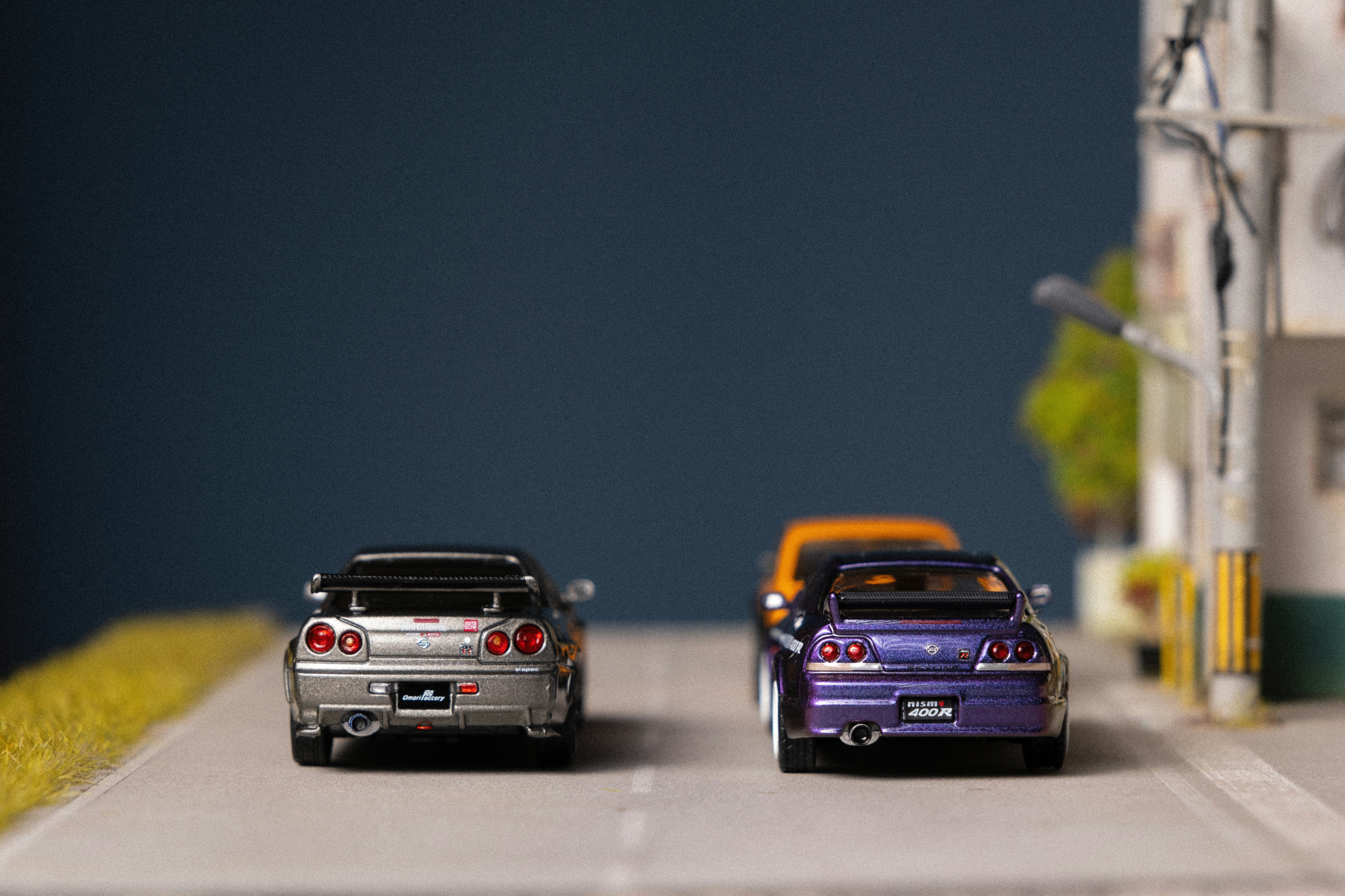 A couple of cars that are sitting in the street