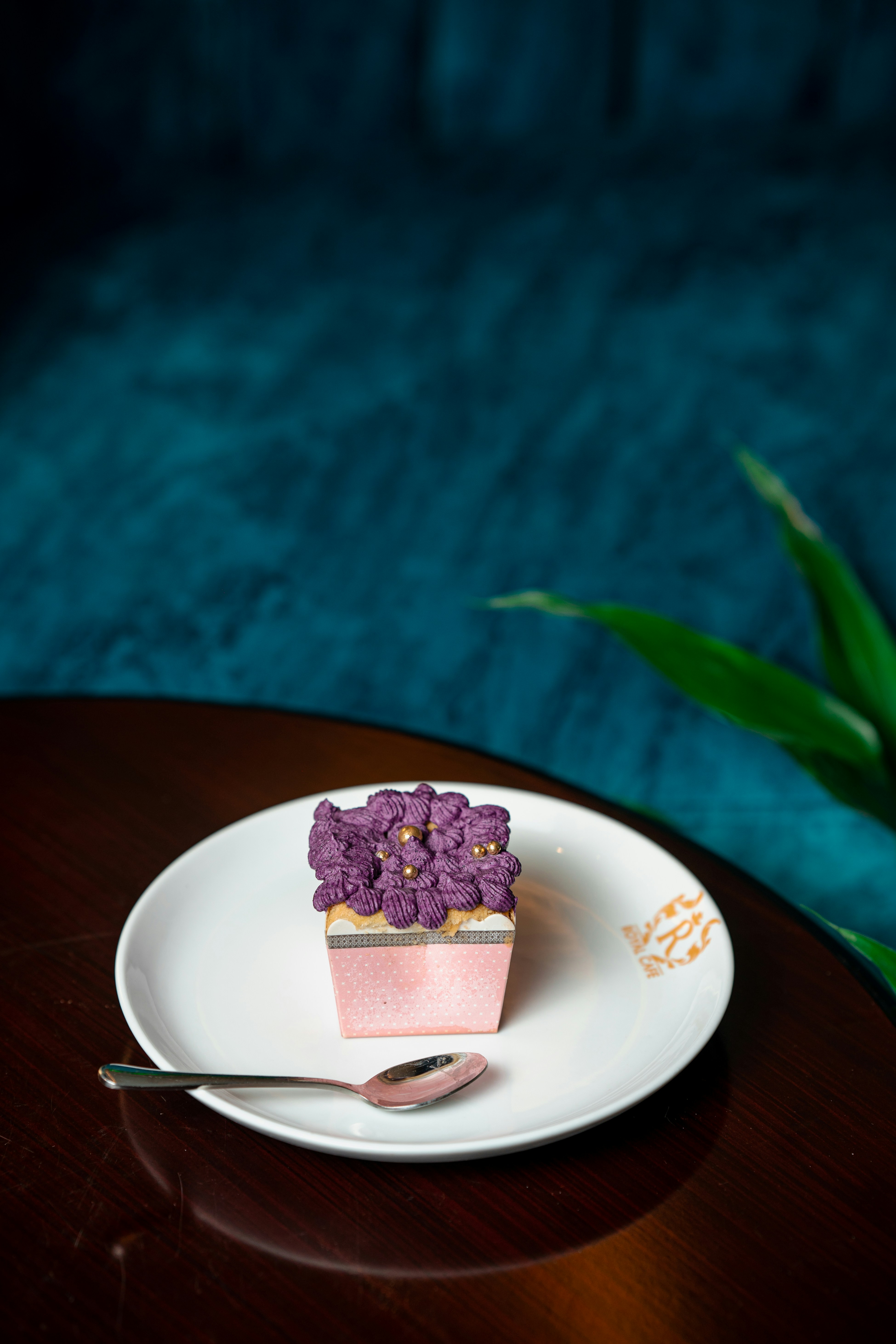 A piece of cake on a plate with a fork