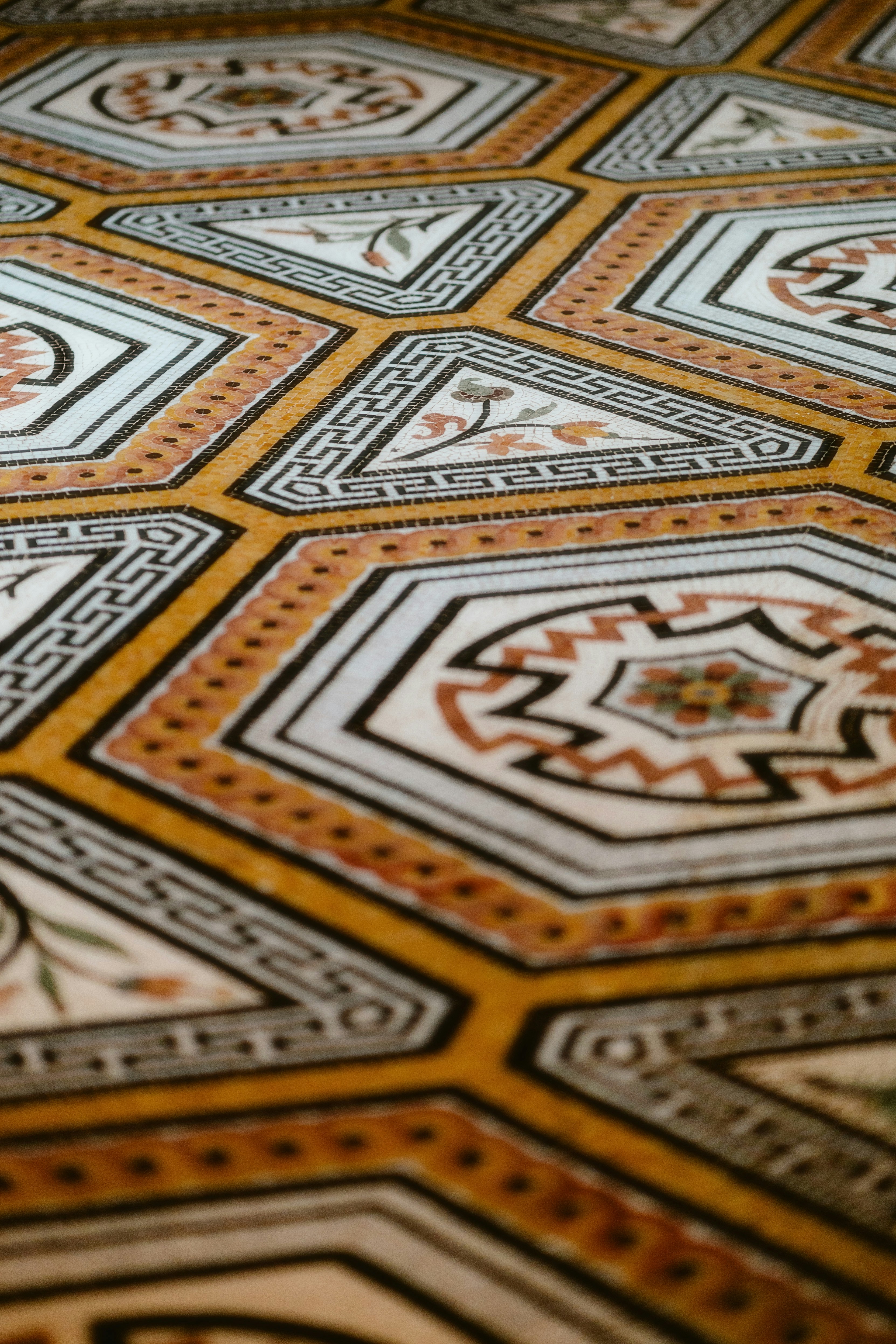A close up of a floor with a pattern on it