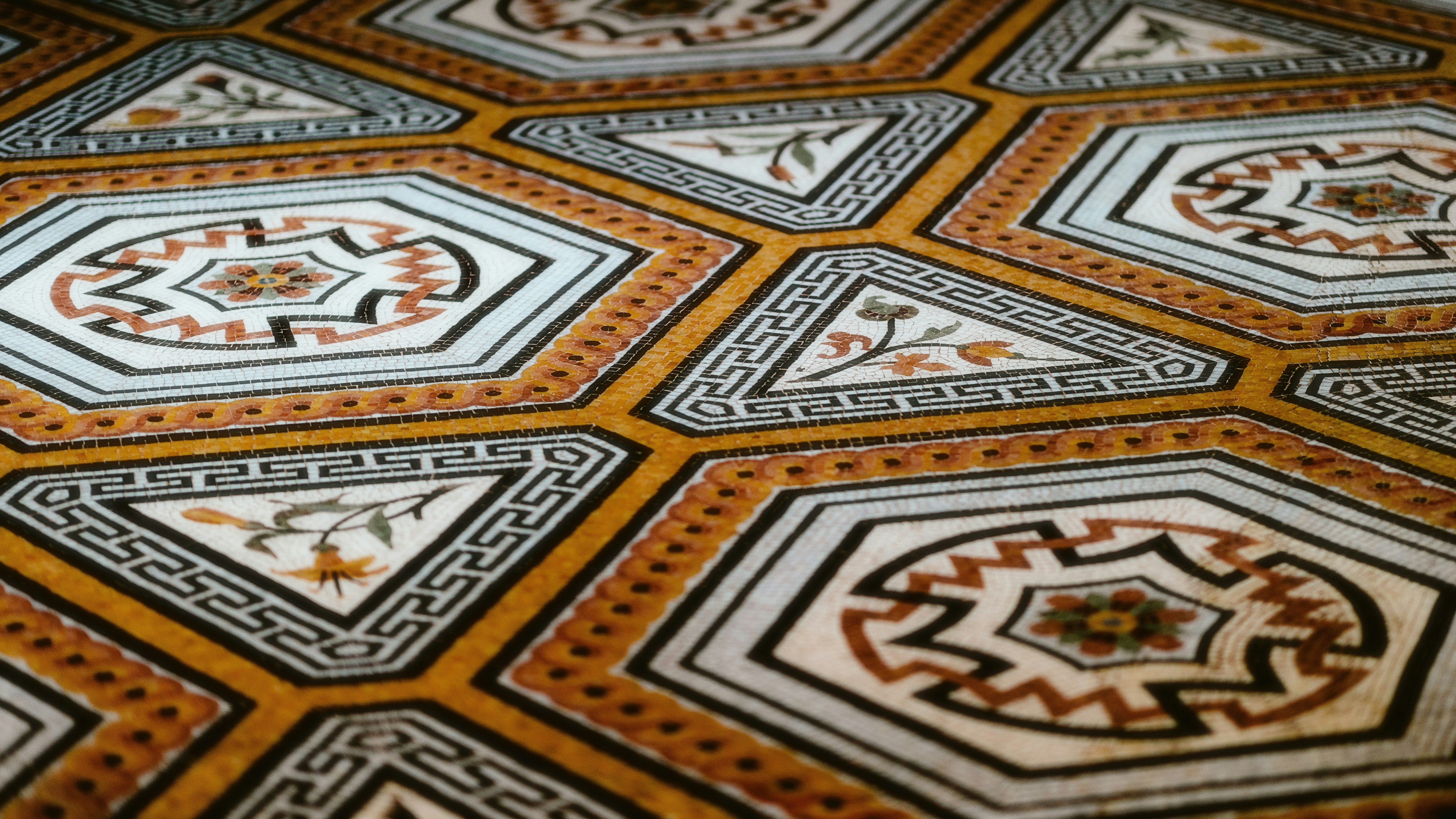 A close up of a floor with a pattern on it