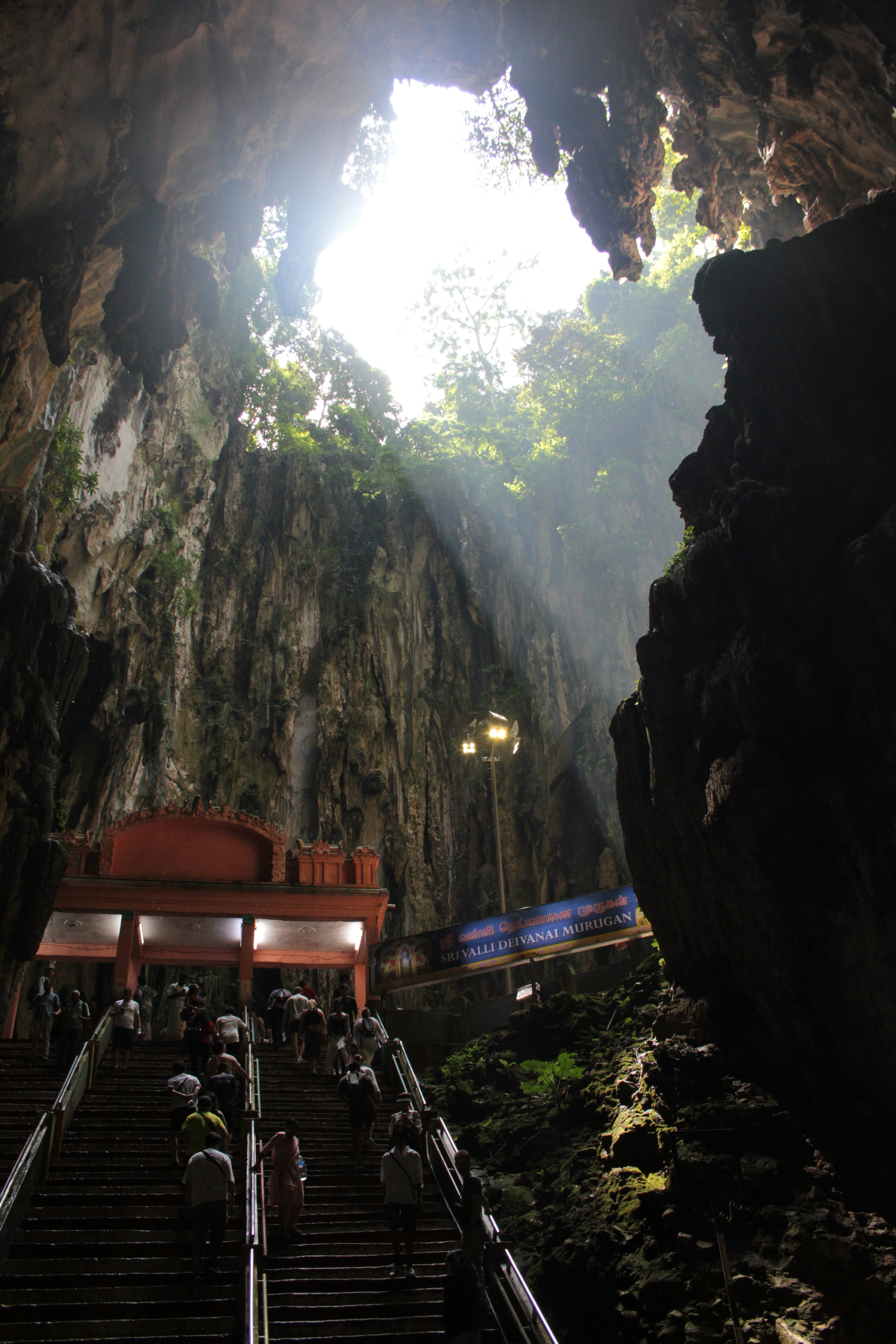 The stairs lead up to the entrance to a cave