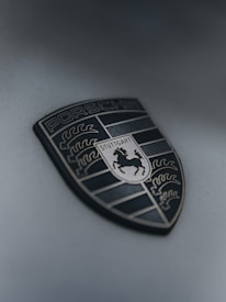 A close up of a badge on a car