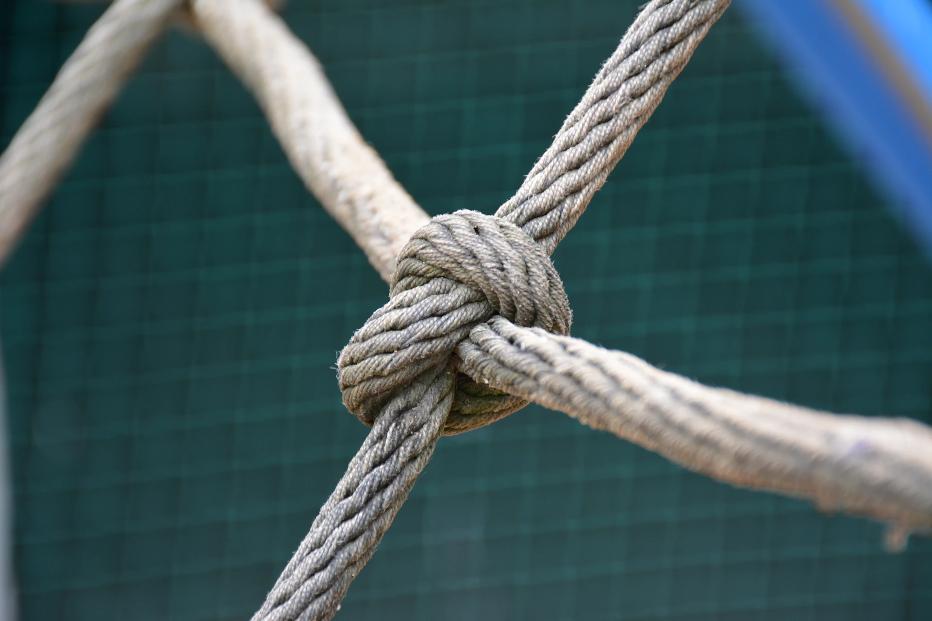 A close up of a knot on a fence