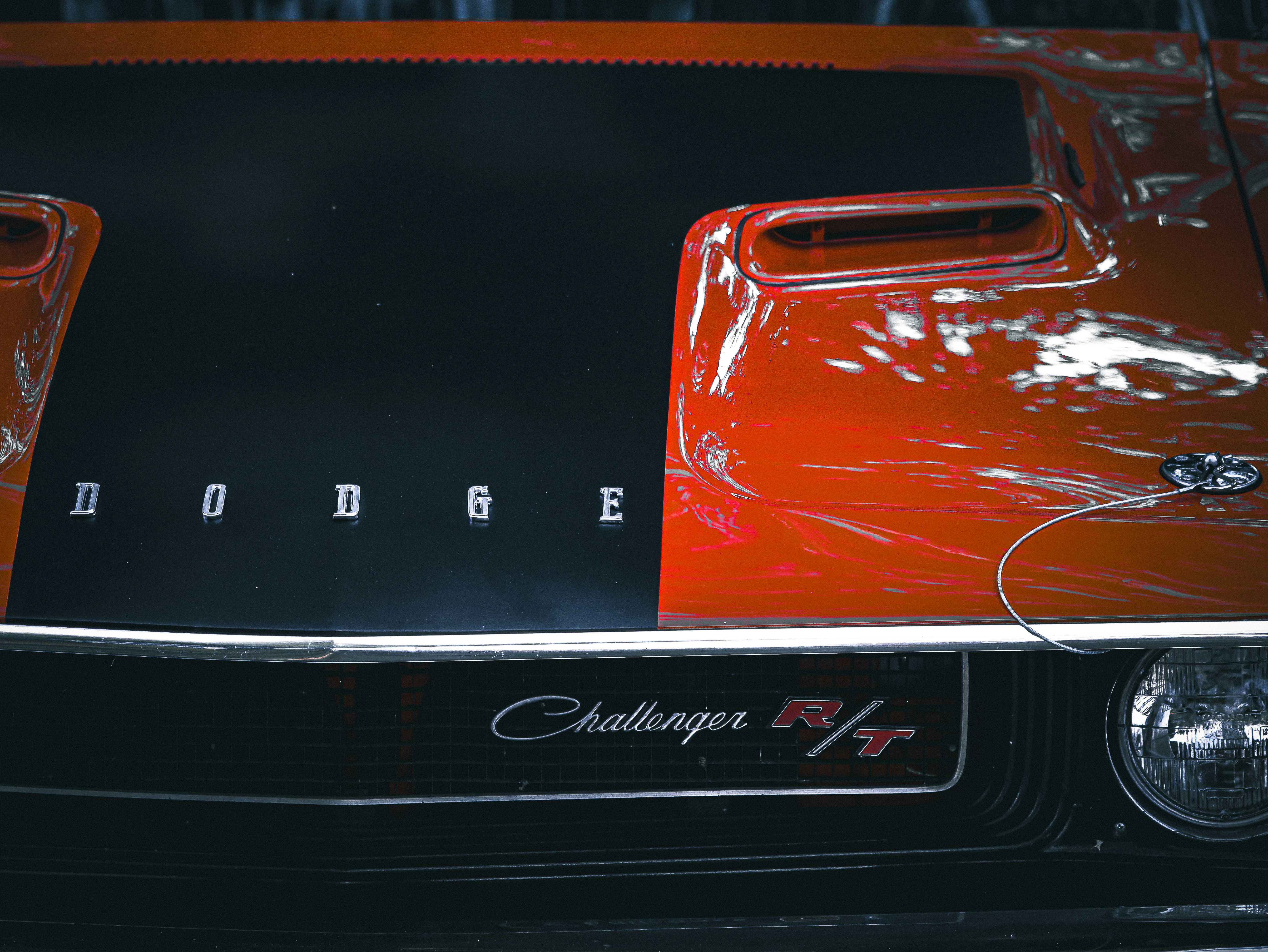 A close up of a red and black car