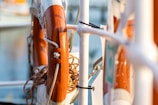 A close up of a white and orange boat