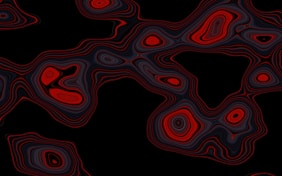 a black background with red and black swirls
