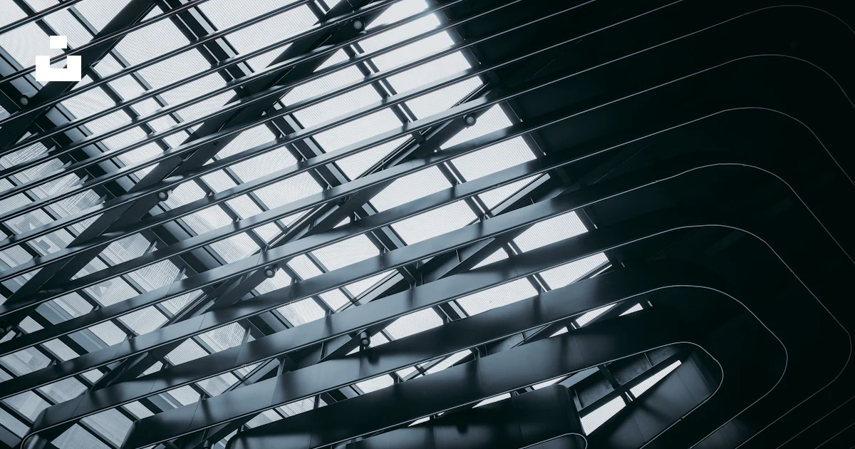 A very tall building with a lot of windows photo – Free Texture Image ...