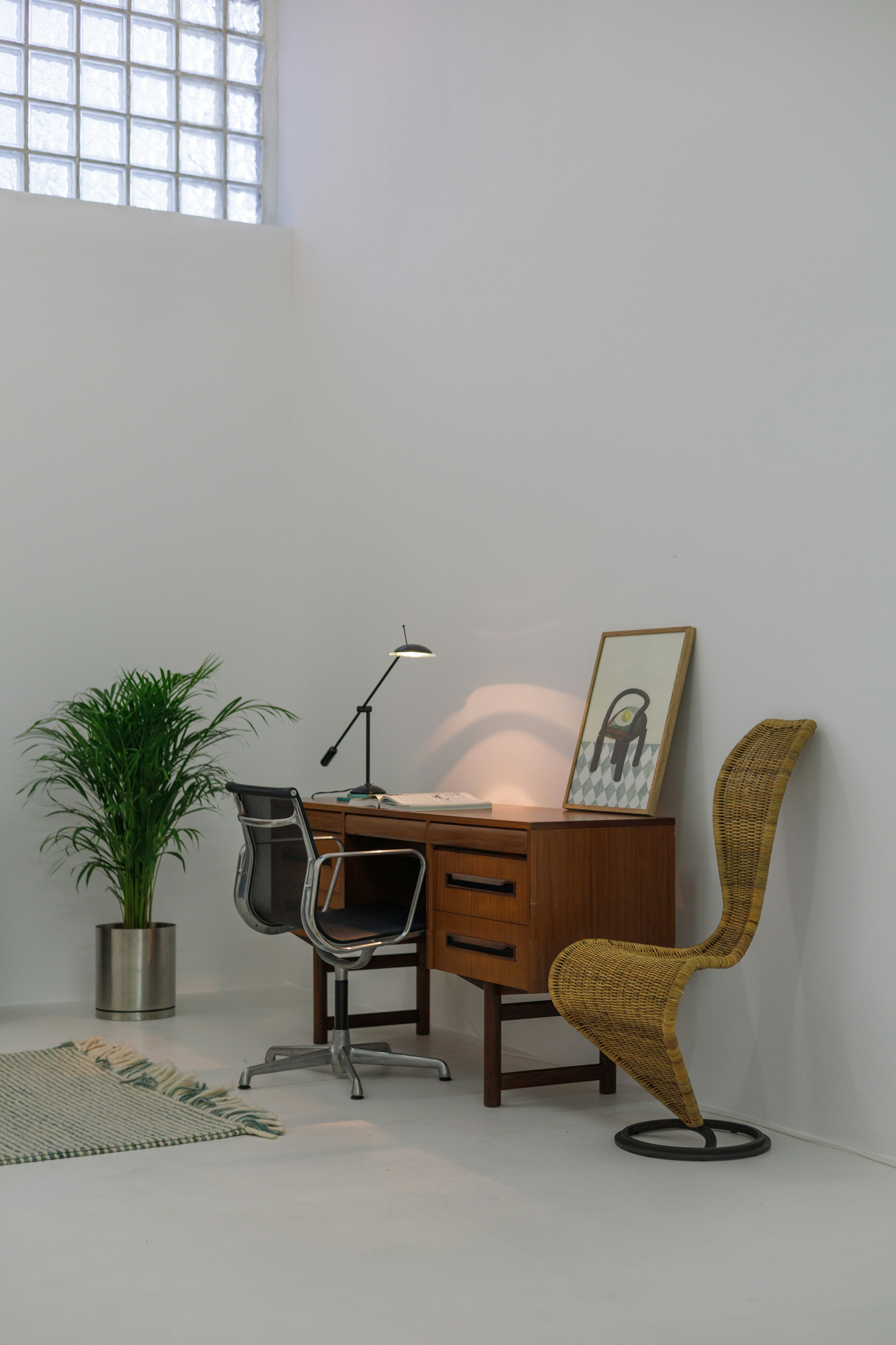 The Aura device sitting on a modern, stylish desk.