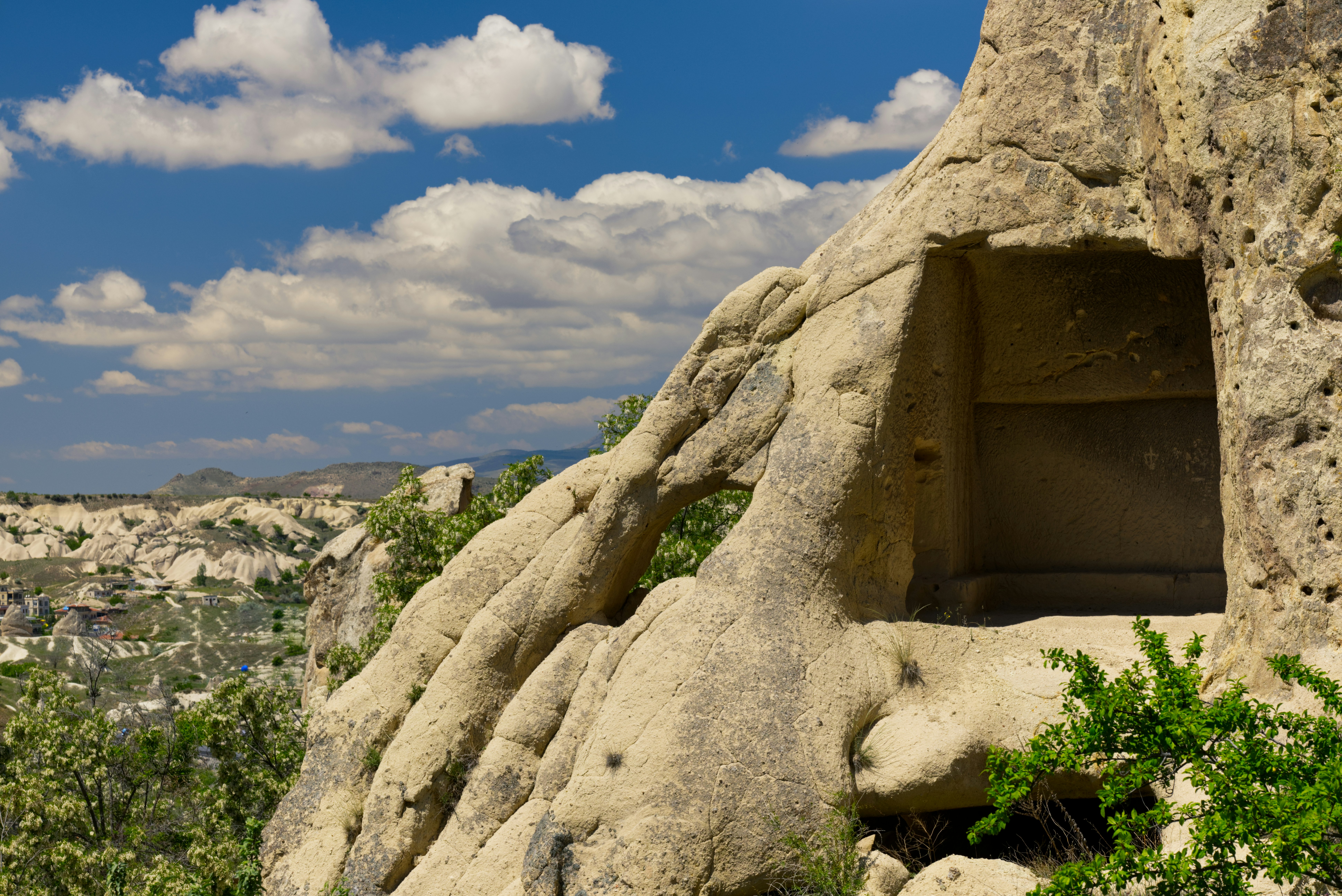 A rock formation with a window in it