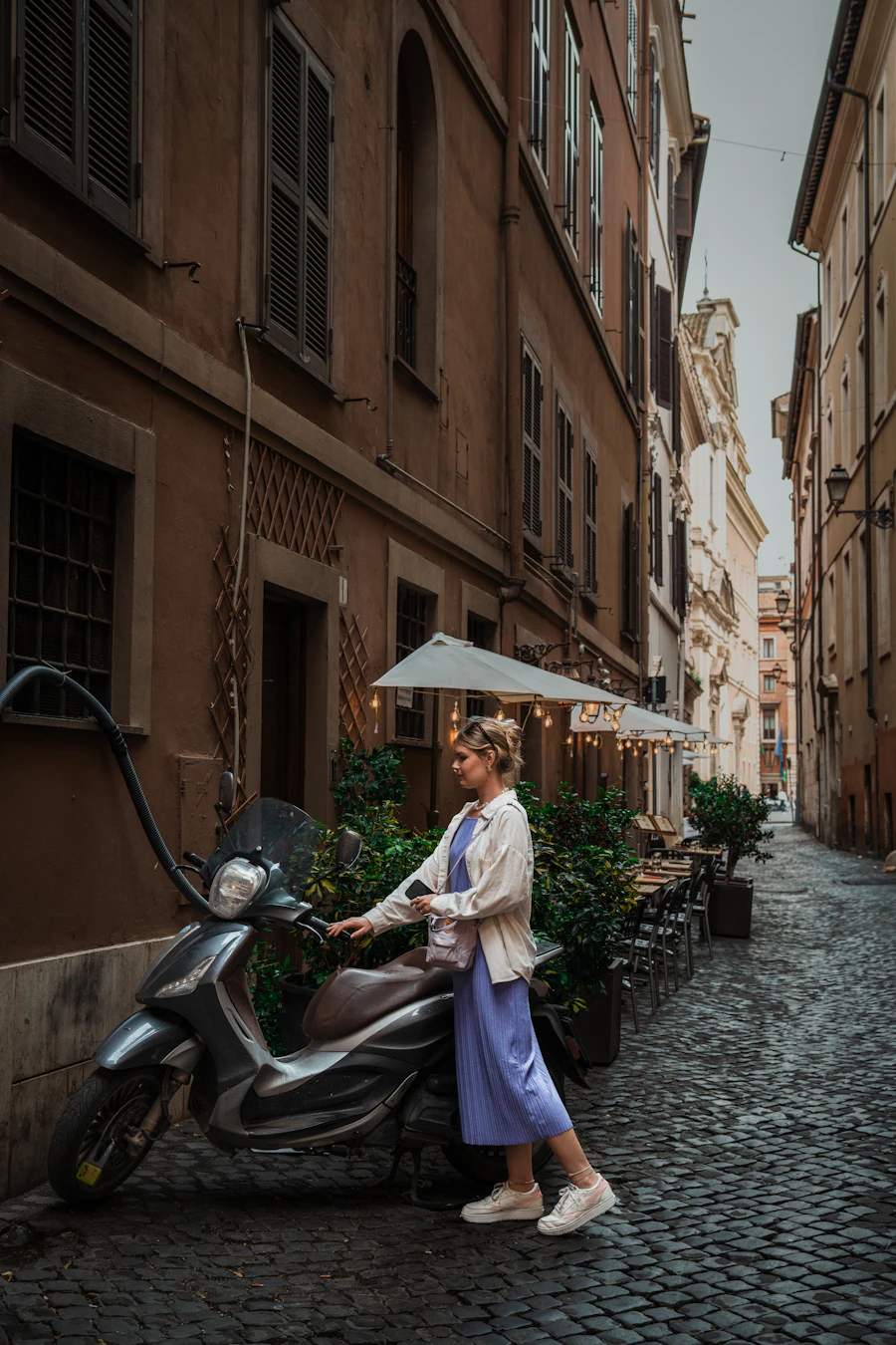 Scooter on a cobblestone city street