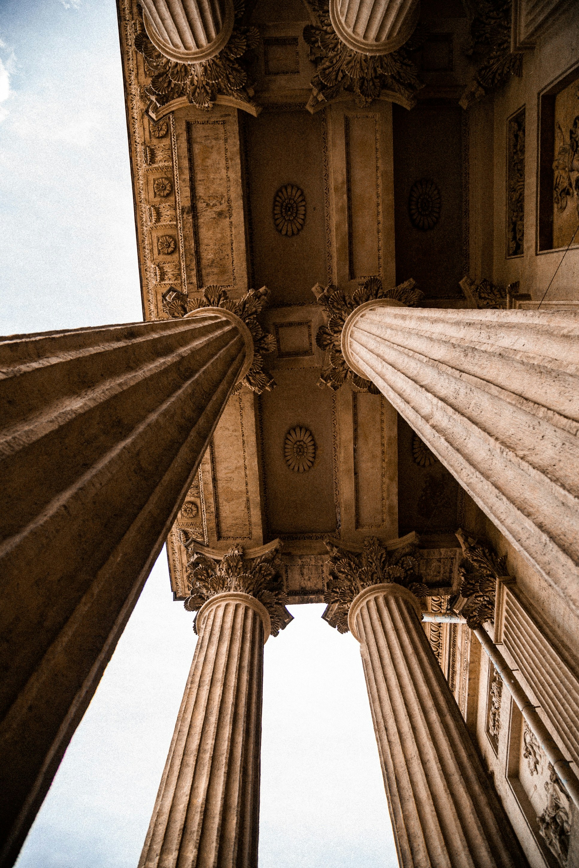 Looking up at the columns of a building