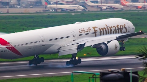 A large jetliner taking off from an airport runway