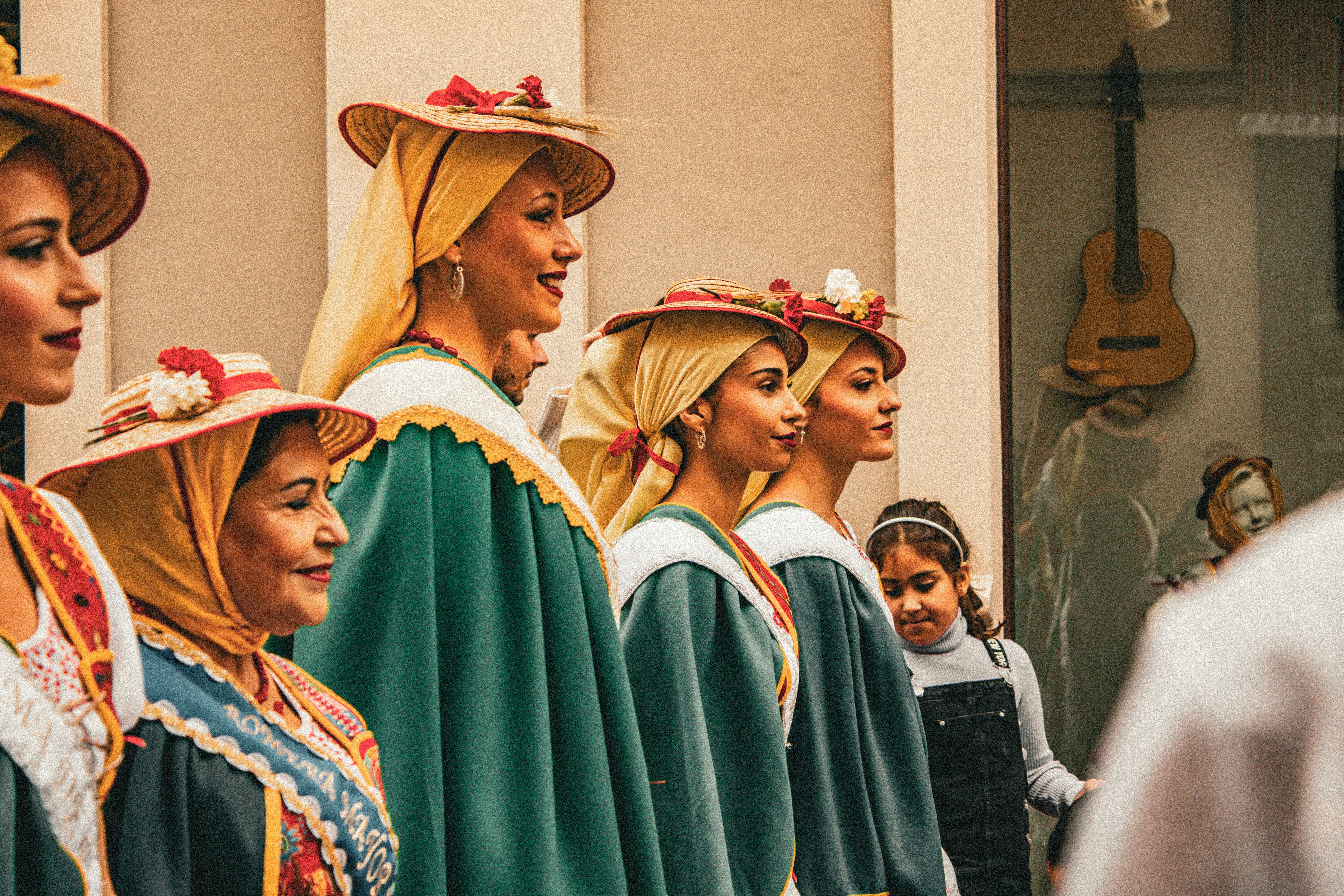 A group of women standing next to each other