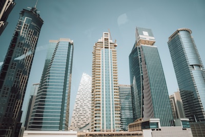 A group of tall buildings sitting next to each other