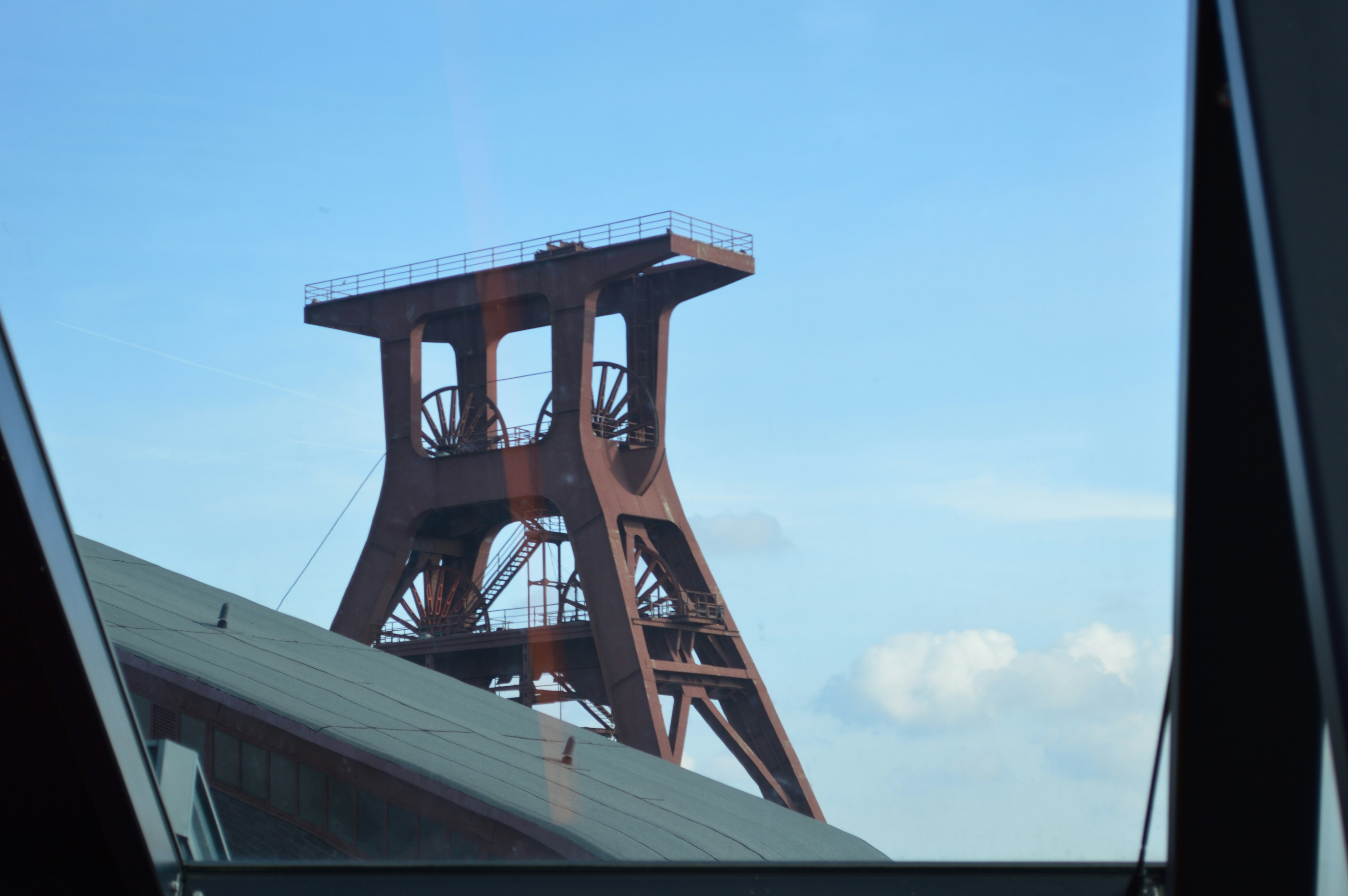 A view of the eiffel tower through a car window