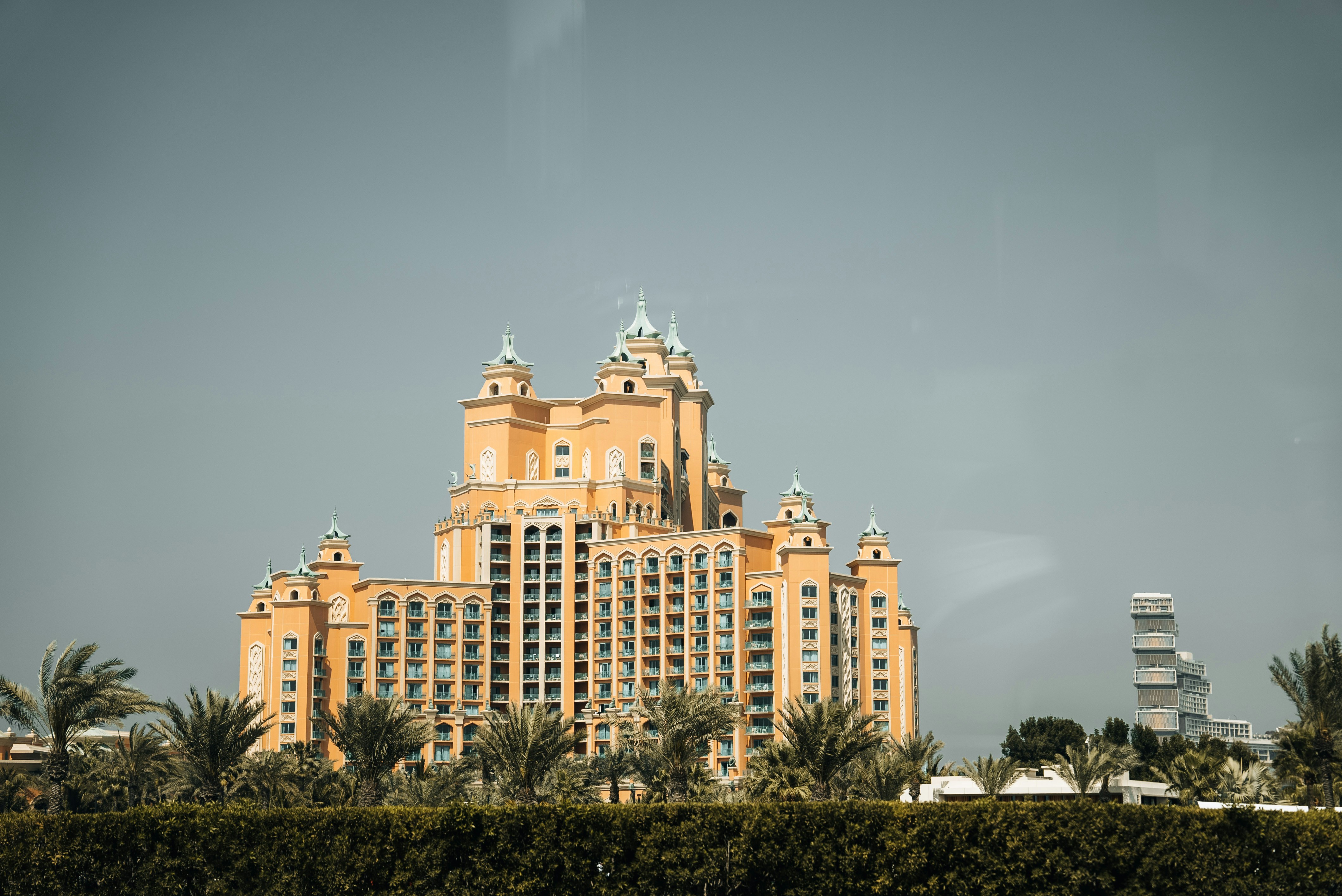 A very tall building with a lot of windows on top of it, 