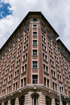 A tall building with a clock on the top of it