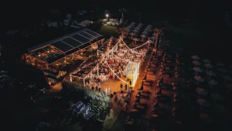 An aerial view of a carnival at night