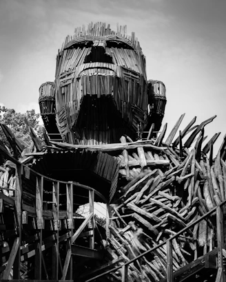 A black and white photo of a wooden boat