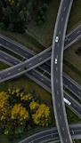 An aerial view of a highway intersection with multiple lanes
