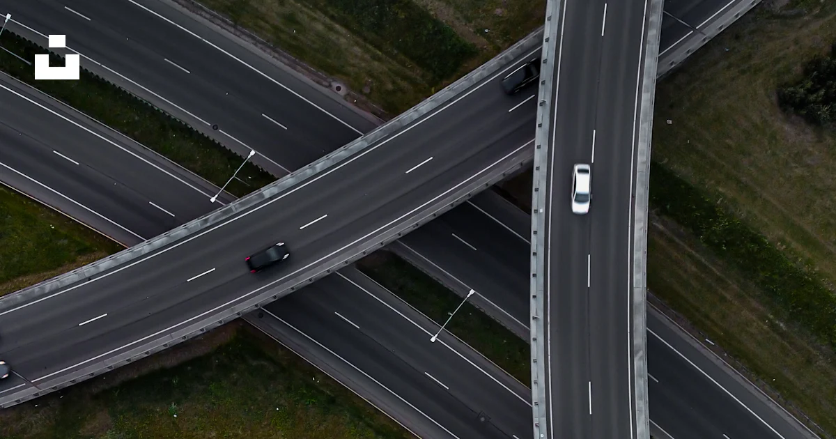 Multiple Intersections Bridge An aerial view of a highway intersection with multiple lanes photo ...