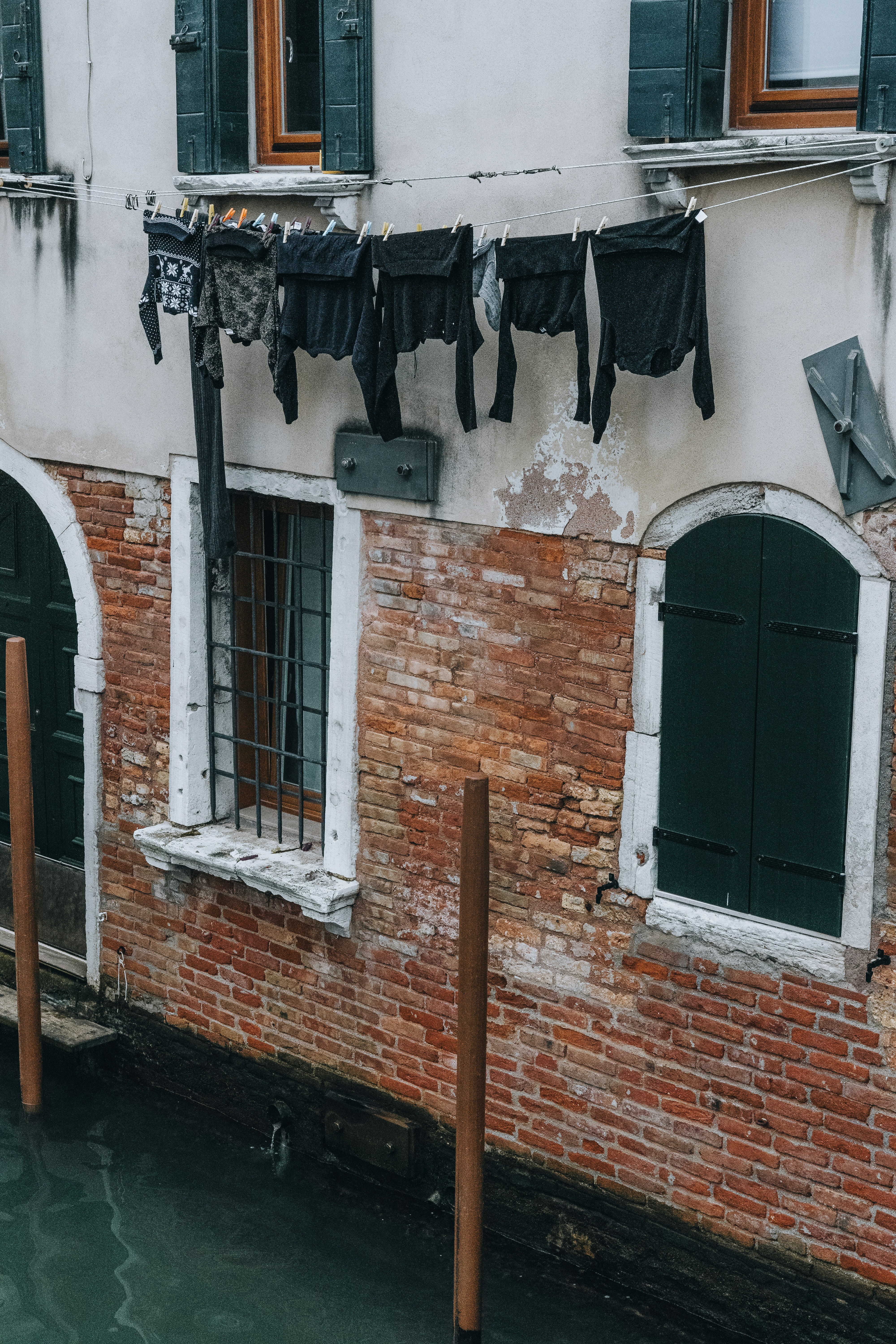 Drying laundry above a canal in Venice.