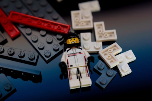 A lego star wars figure laying on top of a table