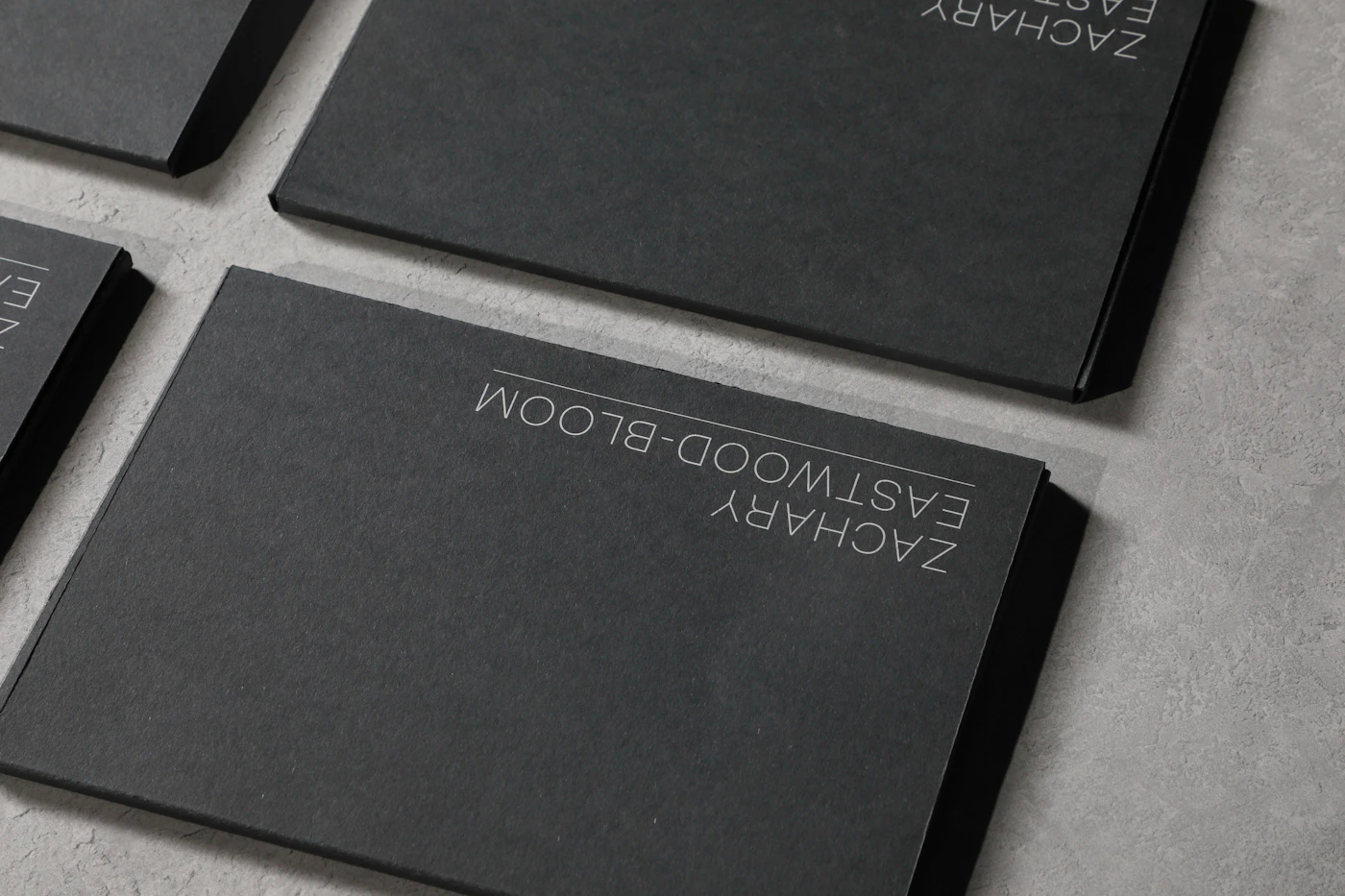 Premium dark luxury brand stationery and embossed identity portfolio