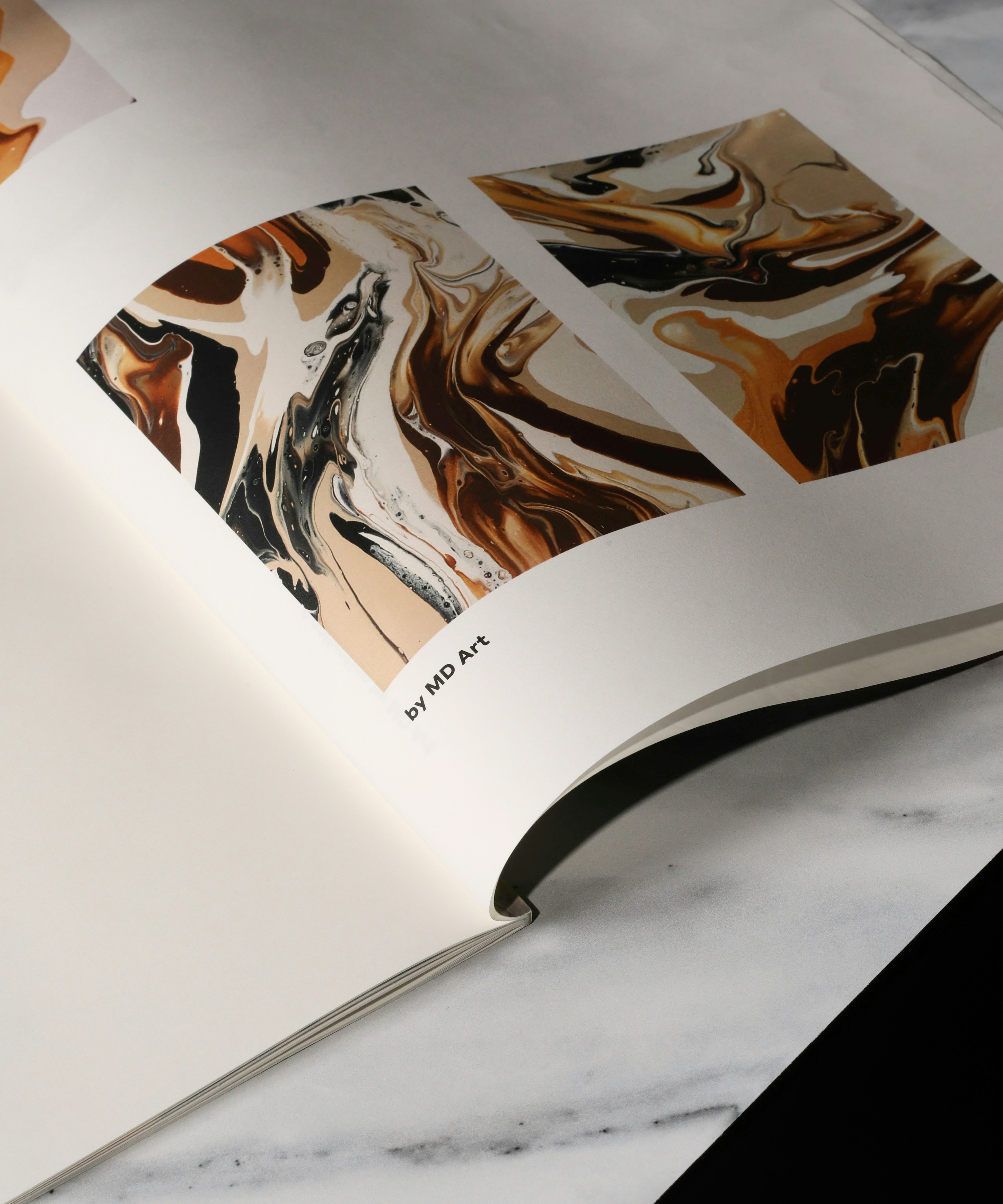 An open book on a marble table