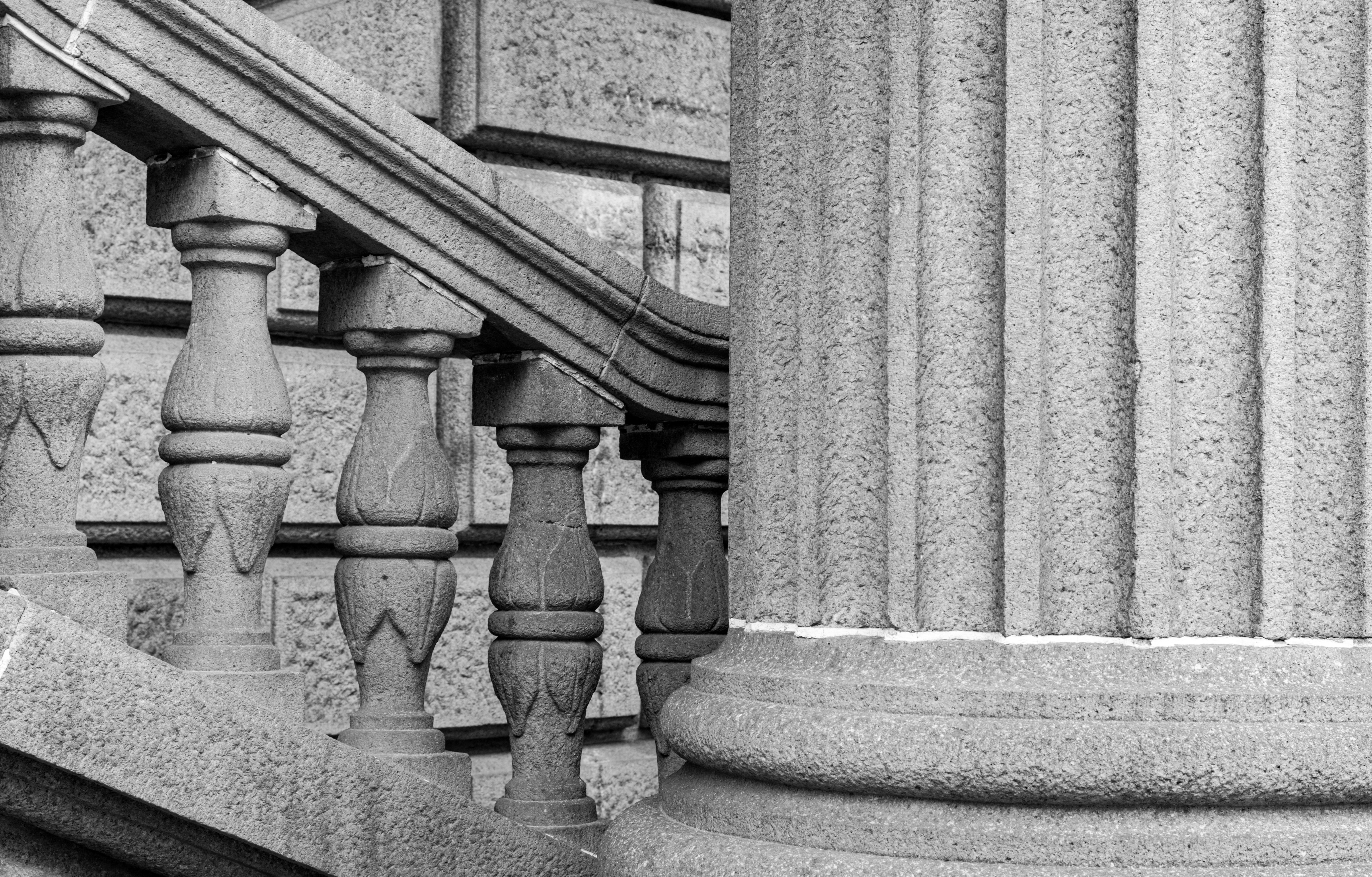 Roman style architectural columns and stair handrails