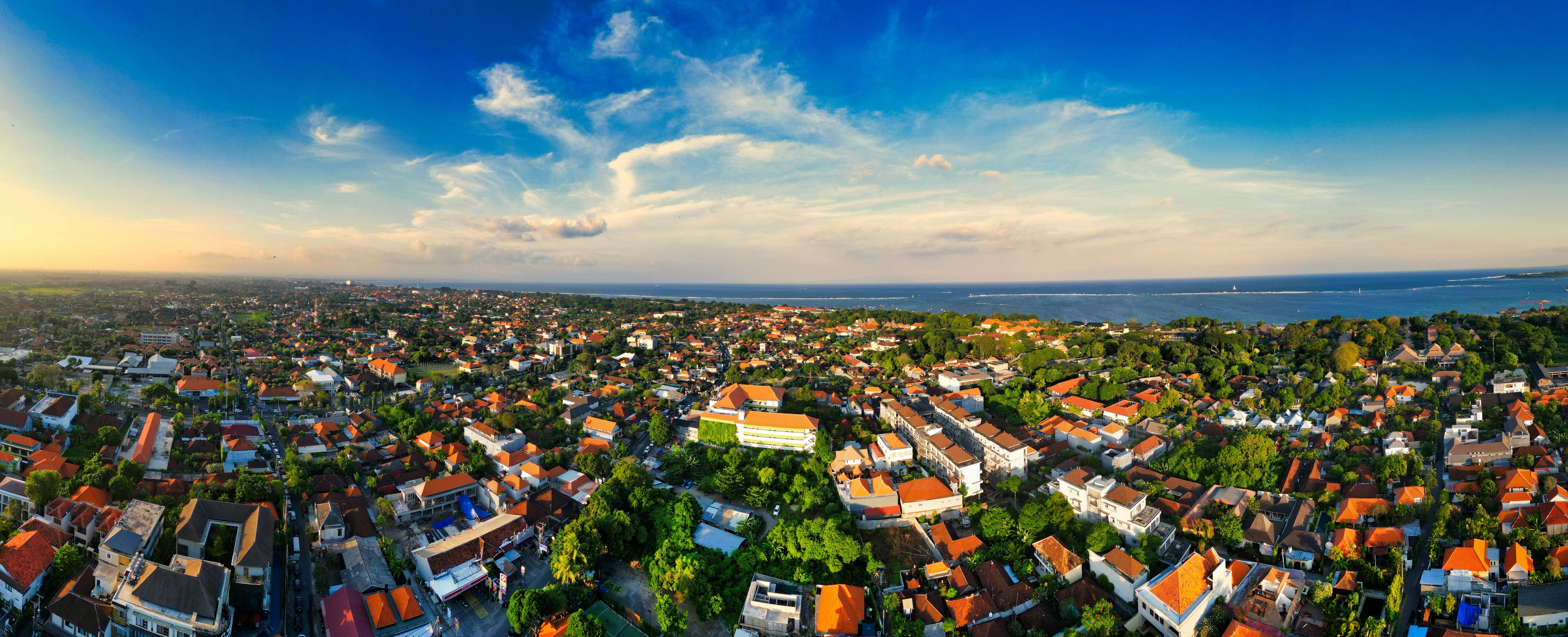 A panoramic view of a city with lots of trees
