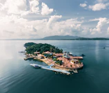 A small island in the middle of a body of water