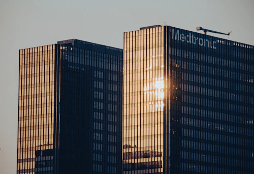 A couple of tall buildings sitting next to each other