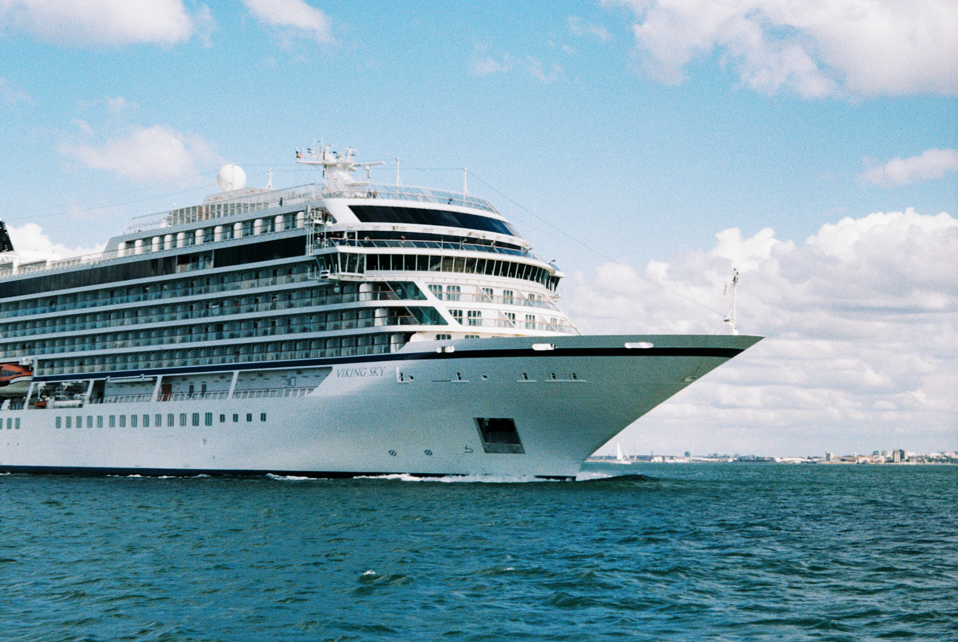 A large cruise ship in the middle of the ocean