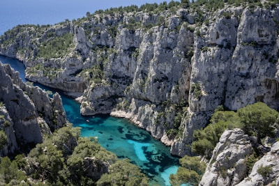 A river flowing through a canyon surrounded by rocks