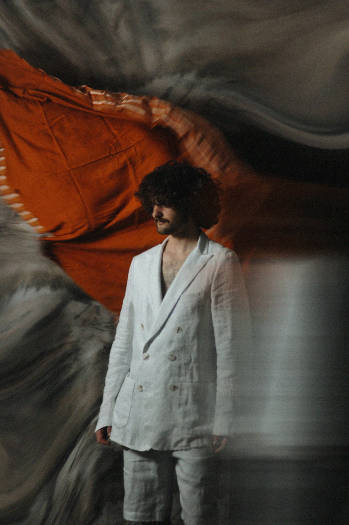 Man in a white linen suit