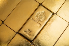 A close up of some gold bars on a table