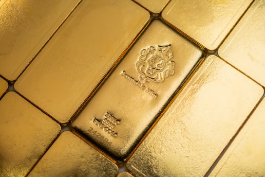 A close up of some gold bars on a table