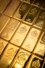 A pile of gold bars sitting on top of a table