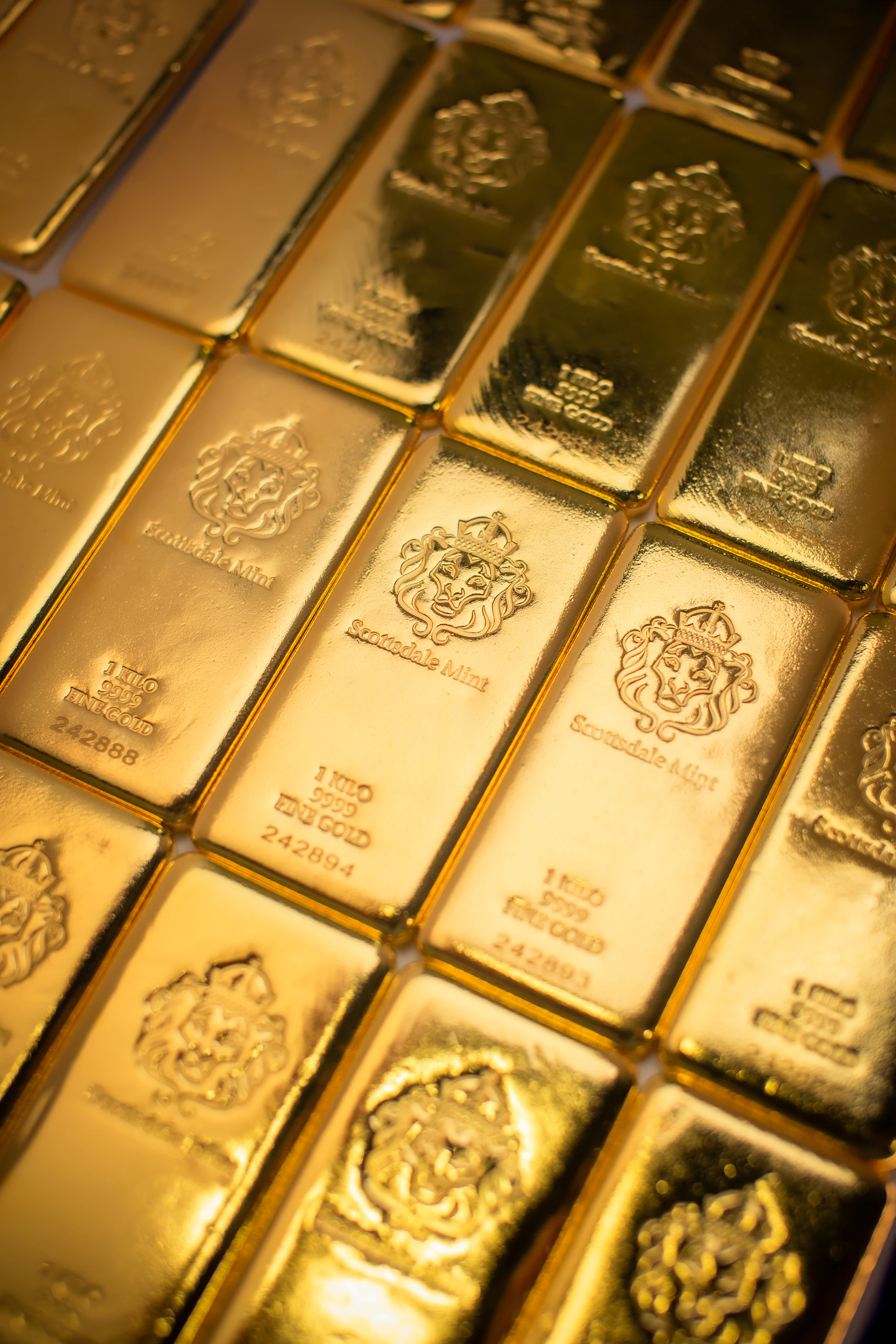 Gold bars representing precious metals trading and gold document fraud