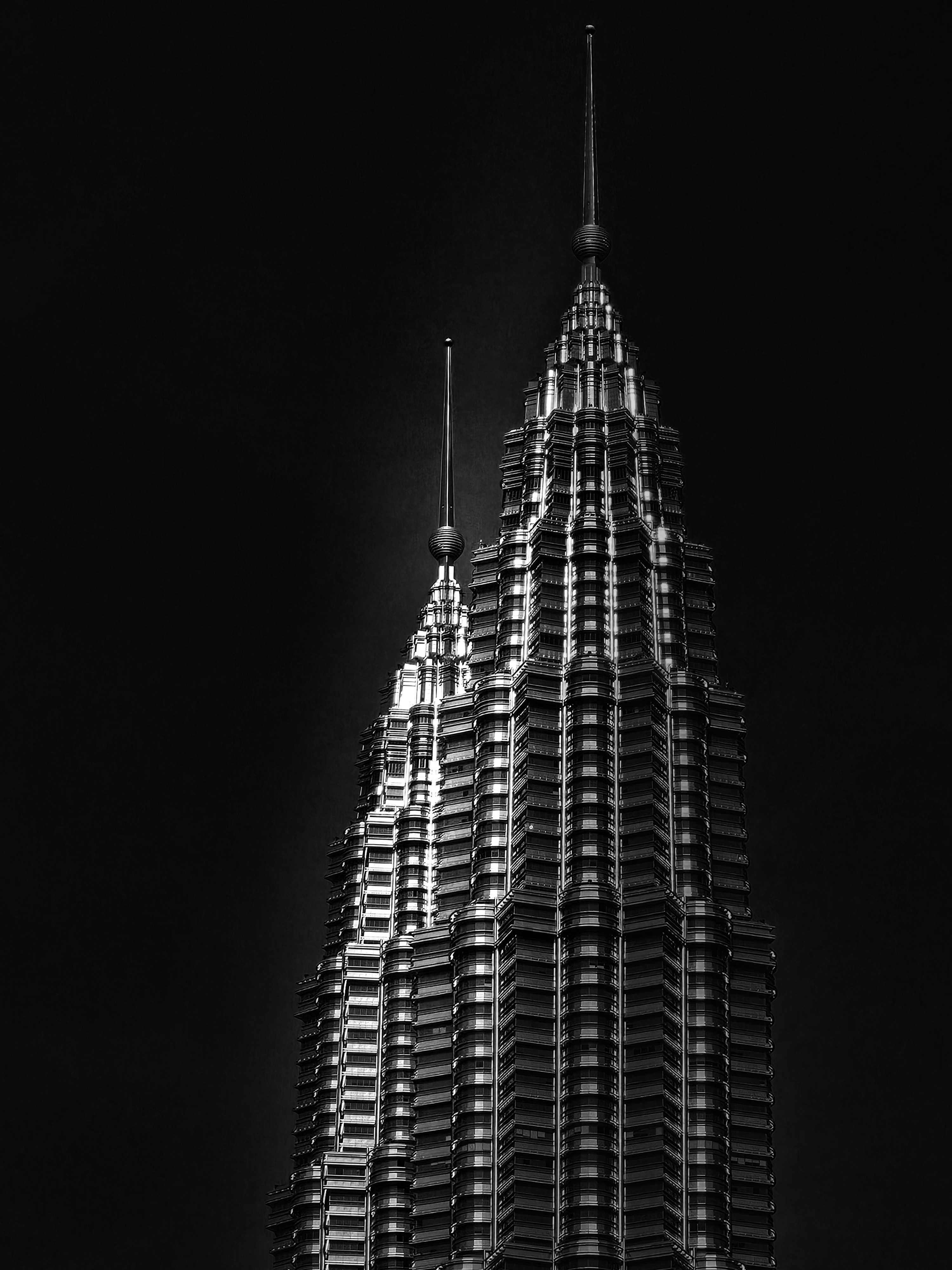 A black and white photo of a very tall building photo – Free Grey Image ...