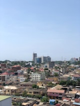 A view of a city from the top of a building