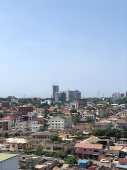 A view of a city from the top of a building