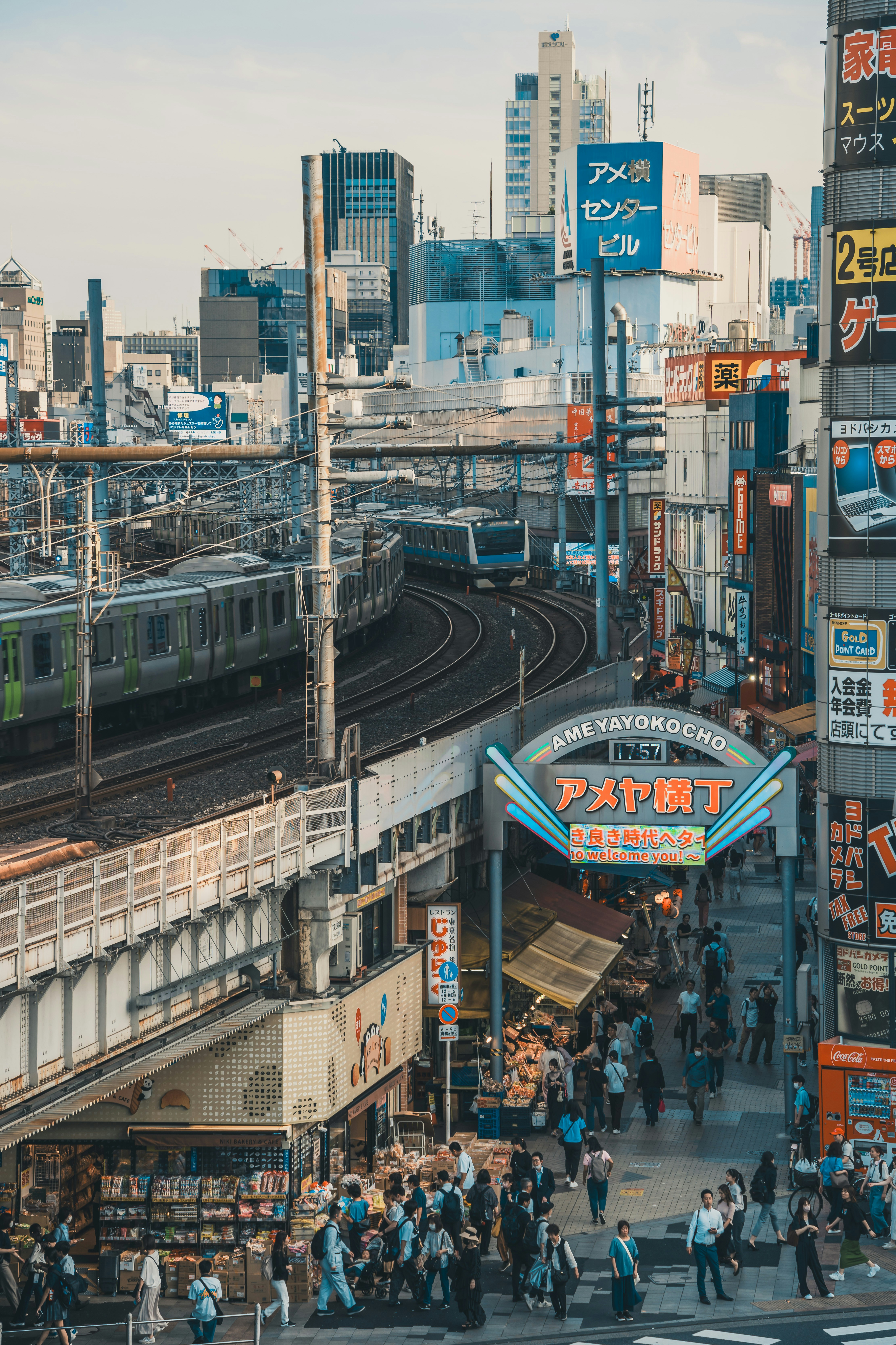 A group of people standing on the side of a road